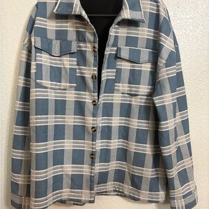 Blue and white striped, button up jacket.